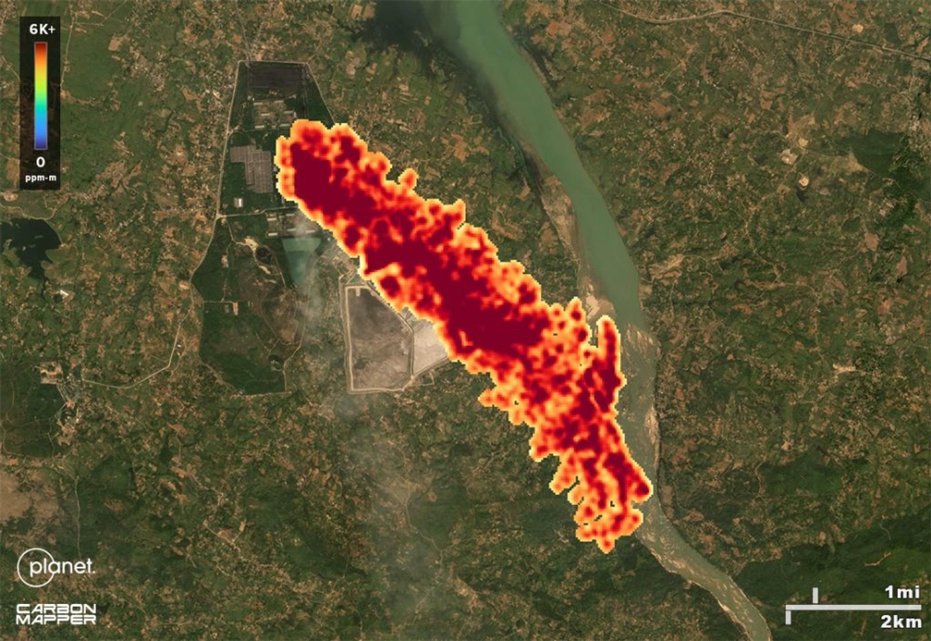 Methane plume from an industrial site beside a river